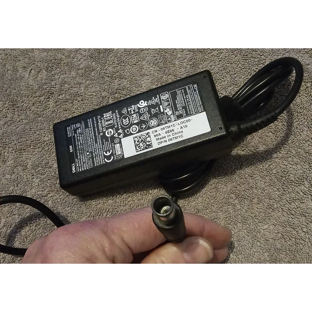 DELL 06TM1C 19.5V 3.34A 65W Genuine Original AC Power Adapter Charger NEW